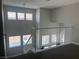 Upstairs loft area with natural lighting and stairs leading down at 9328 Jumpin Juniper Ave, Las Vegas, NV 89129