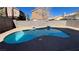 Backyard swimming pool with well maintained perimeter and block wall fence at 9328 Jumpin Juniper Ave, Las Vegas, NV 89129