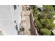 Aerial view of a backyard showing air conditioning unit, patio, and block wall at 9527 Havasu Canyon Ave, Las Vegas, NV 89166