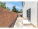 Low-maintenance backyard with block wall, patio, and access from sliding glass door at 9527 Havasu Canyon Ave, Las Vegas, NV 89166