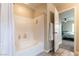 Bright bathroom featuring shower and bath at 9527 Havasu Canyon Ave, Las Vegas, NV 89166