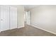 Bedroom featuring neutral walls, carpet floors and a double door closet at 9527 Havasu Canyon Ave, Las Vegas, NV 89166