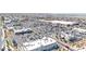 Aerial view of a well-maintained shopping center with ample parking and a variety of storefronts, highlighting convenience at 9527 Havasu Canyon Ave, Las Vegas, NV 89166