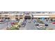 View of a shopping center featuring a Smith's grocery store, showcasing ample parking and convenient shopping options at 9527 Havasu Canyon Ave, Las Vegas, NV 89166