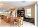 Open dining area with tile floors, bright natural light, and a kitchen view at 9527 Havasu Canyon Ave, Las Vegas, NV 89166