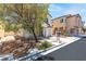 Well-maintained home with desert landscaping, neutral color scheme, attached garage and mature shade tree at 9527 Havasu Canyon Ave, Las Vegas, NV 89166