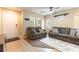 Inviting living room area with two sofas, neutral colors, and plenty of natural light from the window at 9527 Havasu Canyon Ave, Las Vegas, NV 89166