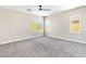 Spacious main bedroom featuring large windows, ceiling fan and neutral walls at 9527 Havasu Canyon Ave, Las Vegas, NV 89166