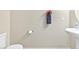 Simple half-bath with pedestal sink and a minimalistic design for a clean and functional space at 9527 Havasu Canyon Ave, Las Vegas, NV 89166