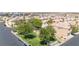 Street view of home with front yard, mature trees, and community mailboxes at 9527 Havasu Canyon Ave, Las Vegas, NV 89166