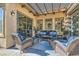 Inviting outdoor patio featuring comfortable seating and a stylish pergola for shade at 1049 Via Saint Lucia Pl, Henderson, NV 89011