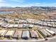 Beautiful aerial view of a residential area by a lake and mountains at 116 Juliette Pointe Ln, Henderson, NV 89011