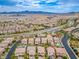 Spacious residential neighborhood with a view of the cityscape and mountains in the distance at 12240 Old Muirfield St, Las Vegas, NV 89141