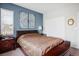 Bedroom featuring a decorative wall, plush carpeting, window, and closet at 12240 Old Muirfield St, Las Vegas, NV 89141