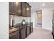 Upstairs hallway with storage cabinets and decorated shelves at 12240 Old Muirfield St, Las Vegas, NV 89141