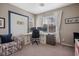 Home office featuring custom wall accents, plush carpeting, and neutral paint at 12240 Old Muirfield St, Las Vegas, NV 89141