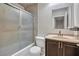 Bright bathroom featuring a glass enclosed shower and updated vanity at 1344 Lorilyn Ave # 3, Las Vegas, NV 89119