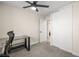 Bedroom featuring a ceiling fan, closet, and desk at 1516 Saylor Way, Las Vegas, NV 89108