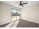 Bedroom with a glass door, and ceiling fan at 1516 Saylor Way, Las Vegas, NV 89108