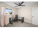 Bedroom with a ceiling fan and bright window at 1516 Saylor Way, Las Vegas, NV 89108