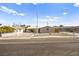 Street view of a well-maintained single-story home with a secure fenced front yard at 1516 Saylor Way, Las Vegas, NV 89108