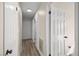 Hallway featuring a door for access and neutral walls at 1516 Saylor Way, Las Vegas, NV 89108