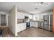 Well-lit kitchen with stainless steel appliances, granite countertops, and white cabinetry at 1516 Saylor Way, Las Vegas, NV 89108