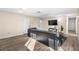 Comfortable living room featuring wood floors and ample space at 1516 Saylor Way, Las Vegas, NV 89108