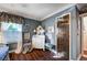 Bedroom with a dark accent wall boasts a bright window and classic furnishings at 1905 Calle De Espana, Las Vegas, NV 89102