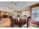 Dining area with hardwood floors, stylish furniture, and adjacent access to living area at 1905 Calle De Espana, Las Vegas, NV 89102