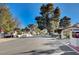 Neighborhood street view featuring mature trees and well-maintained landscaping on a clear day at 1905 Calle De Espana, Las Vegas, NV 89102