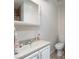 Bathroom featuring a vanity sink, toilet, and tiled floor at 212 Huntly Rd, Las Vegas, NV 89145