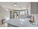 Modern kitchen featuring white countertops and a stainless steel refrigerator at 2129 N Michael Way, Las Vegas, NV 89108