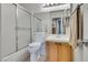 Bathroom with a shower-tub combo, tile floors, and a single sink vanity at 2141 Twickenham Pl # A, Las Vegas, NV 89108