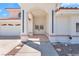 Arched entryway with double doors, tile flooring, and access to the three-car garage at 2161 Avalon Dr, Laughlin, NV 89029