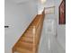 Bright foyer with wooden staircase, chandelier, and tile flooring at 2161 Avalon Dr, Laughlin, NV 89029