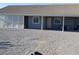 The backyard has a covered patio area with white lattice and desert landscaping, ready for customization at 2731 W Huron Ln, Pahrump, NV 89048