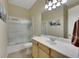 Bathroom featuring neutral walls, tiled floor, vanity, and walk-in shower at 2756 Strathblane Ave, Henderson, NV 89044