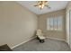 Bedroom featuring neutral walls, carpet, ceiling fan, a recliner, and closet at 2756 Strathblane Ave, Henderson, NV 89044