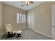 Bedroom featuring neutral walls, carpet, ceiling fan, a recliner, and closet at 2756 Strathblane Ave, Henderson, NV 89044