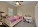 Cozy bedroom with neutral walls, ceiling fan, carpet, and a closet at 2756 Strathblane Ave, Henderson, NV 89044