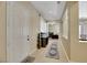 Bright entryway with tile flooring, a view into the living room and a decorative aquarium at 2756 Strathblane Ave, Henderson, NV 89044