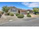 Charming single-story home boasts a well-manicured yard and a two-car garage at 2756 Strathblane Ave, Henderson, NV 89044