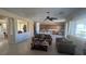 Spacious living room featuring tile floors and an open floor plan with kitchen views at 2764 Leys Burnett Ave, Henderson, NV 89044