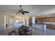 Spacious living room featuring an open floor plan with a couch and tile flooring throughout at 2764 Leys Burnett Ave, Henderson, NV 89044