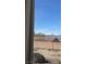 Scenic view of mountains and clear blue sky from a large backyard with low landscaping at 2764 Leys Burnett Ave, Henderson, NV 89044