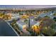 Panoramic aerial view of a home with a private backyard and sparkling city lights in the distance at 2785 Soft Horizon Way, Las Vegas, NV 89135