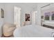 Bright bedroom with comfortable seating and access to the ensuite bathroom at 2785 Soft Horizon Way, Las Vegas, NV 89135