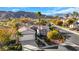 Beautiful front exterior with mountain views, desert landscaping, and a paved driveway at 2785 Soft Horizon Way, Las Vegas, NV 89135