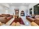 Spacious living room featuring a modern fireplace and comfortable seating at 2785 Soft Horizon Way, Las Vegas, NV 89135